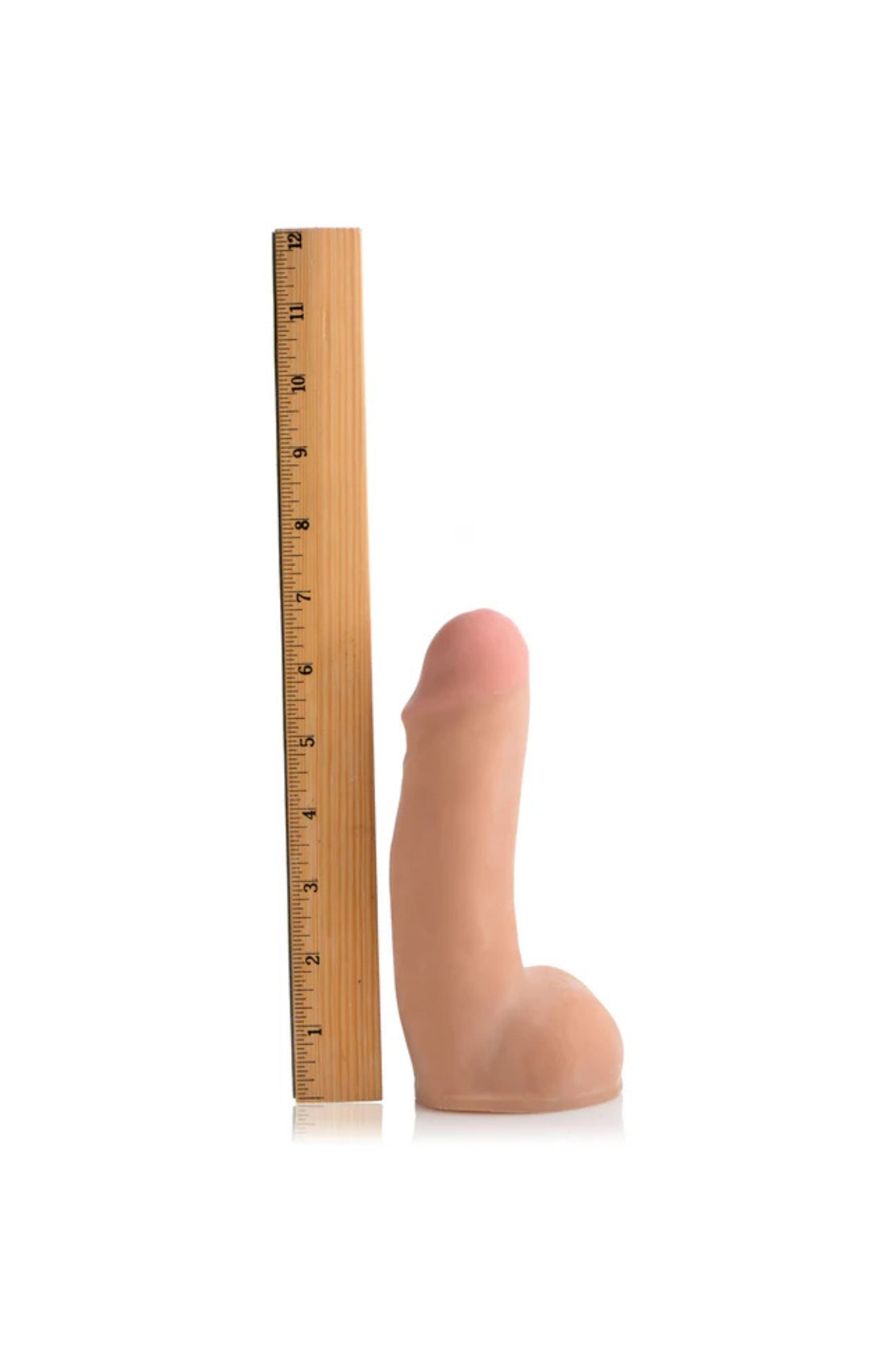 DILDO CON BOLAS EYACULADOR 7"